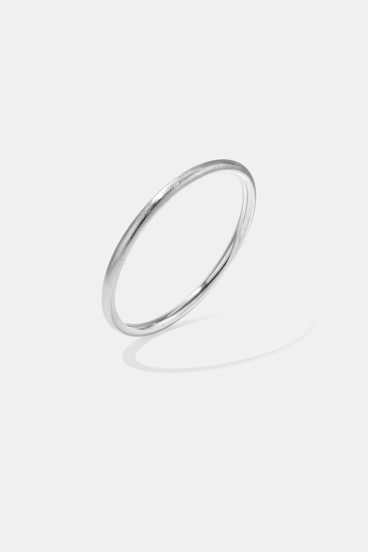Elara Bangle Bracelet in brushed silver, 5 mm width.