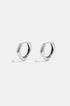 A pair of silver Astra hoop earrings with a unique square shape and rounded edges.