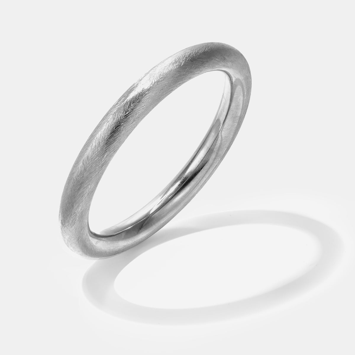 Elara Polished Bangle Bracelet in silver, 10 mm wide, with a brushed finish.