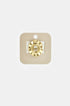 Gold irregular minimalist ring on a beige card.