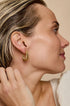 Gold Astra Hoop Earrings with a minimalist, layered design.