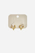 Ondine Irregular Hoop Earrings with gold PVD coating on a light beige card.