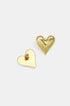 Gold heart stud earrings, one with a brushed finish, the other flat and smooth.
