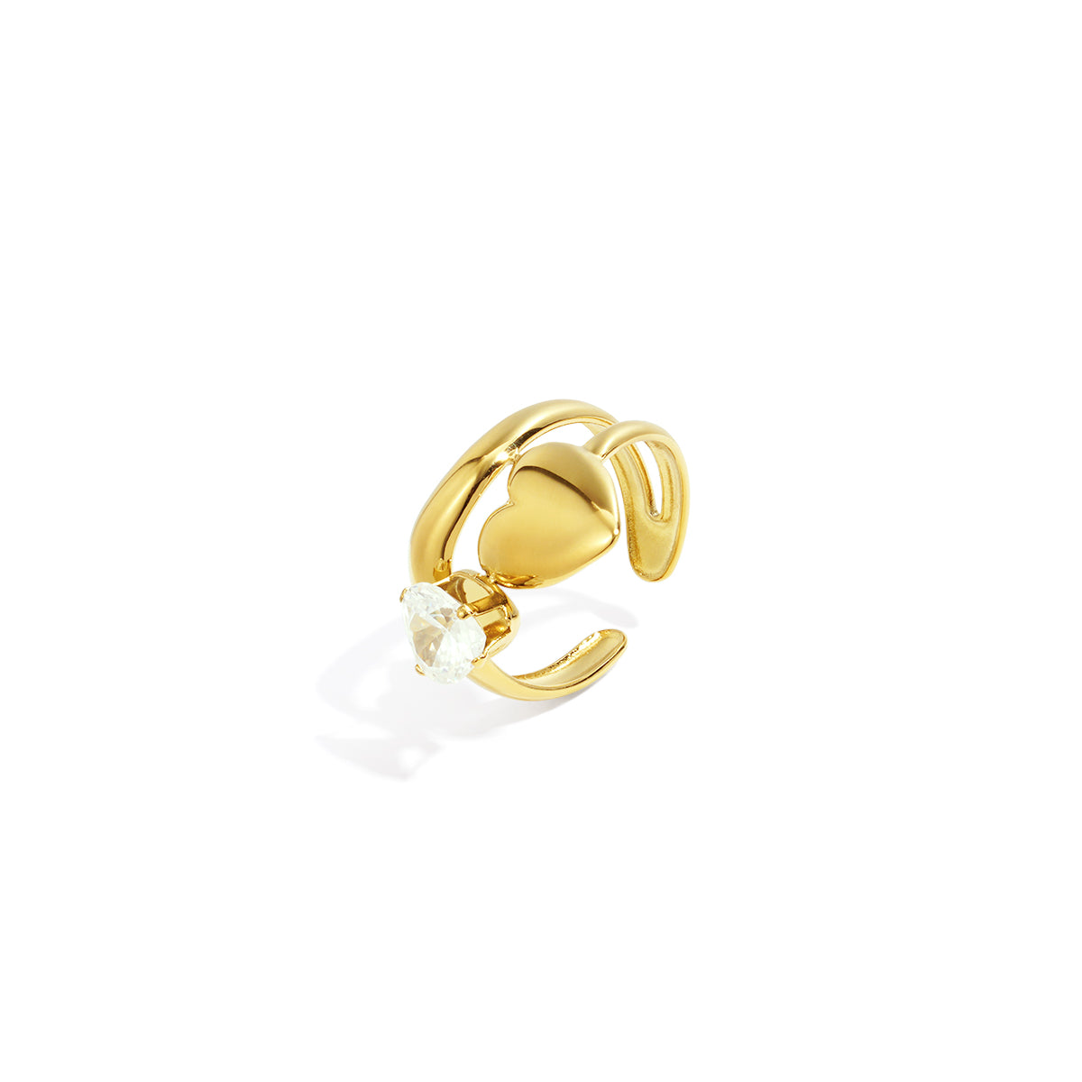 Gold ring with a heart shape and a clear zircon gemstone.