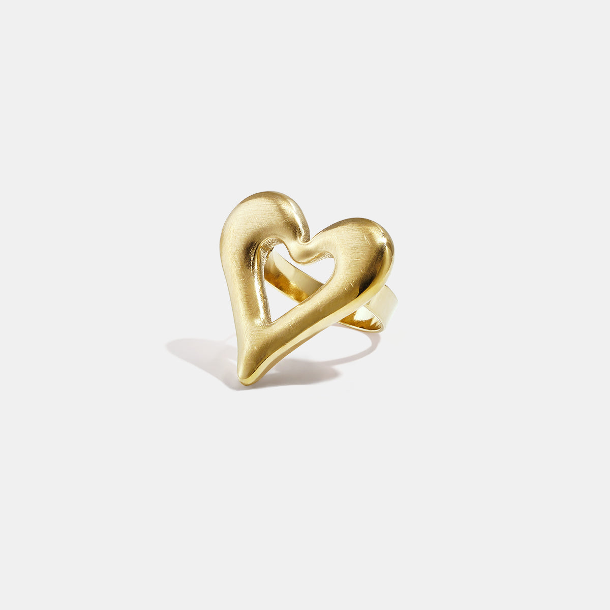 Gold heart-shaped ring with an open center, made of stainless steel with 18K gold PVD coating.