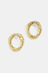 Two gold-toned, irregular-shaped stud earrings with a brushed finish.