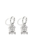Silver hoop earrings with dangling scarab beetle charms.