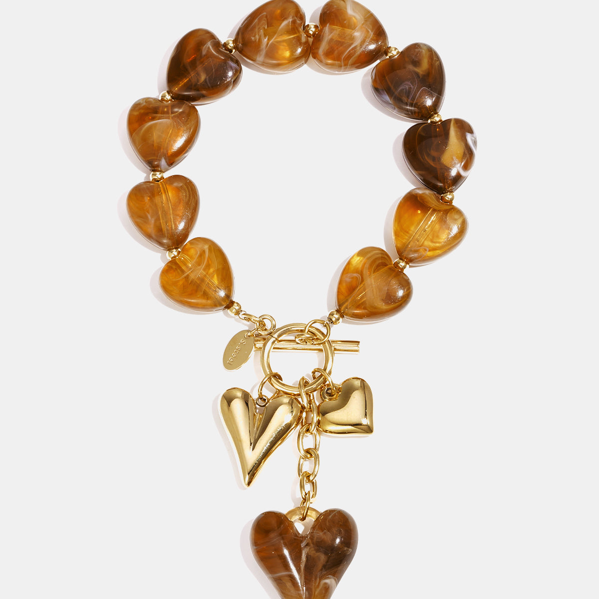 Heart Charm Beaded Bracelet with gold accents and brown heart beads.