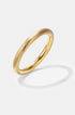 Elara Polished Bangle Bracelet in gold with a brushed finish.