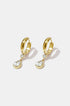 Gold hoop earrings with a pear-shaped zircon drop and a smaller round zircon above it.