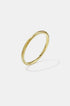 Elara Bangle Bracelet in gold with a brushed finish, 6 mm wide.