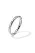 A simple, brushed stainless steel bangle with a subtle sheen, casting a soft shadow on a white background.