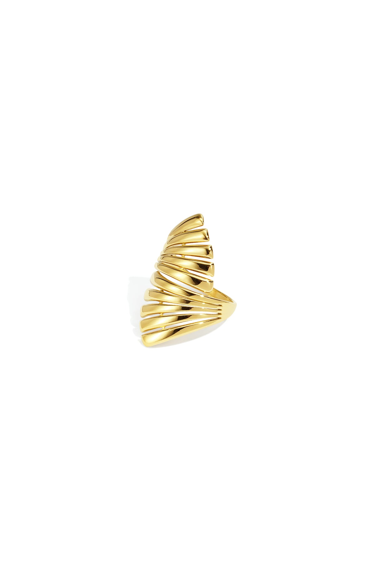 Irregular gold-toned statement ring with layered, curved metal.