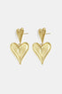 Gold heart drop earrings with a smaller heart stud and a larger dangling heart.