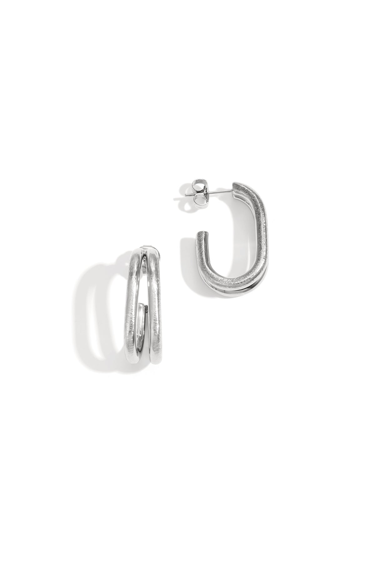 Silver Astra Hoop Earrings with a double-loop design.