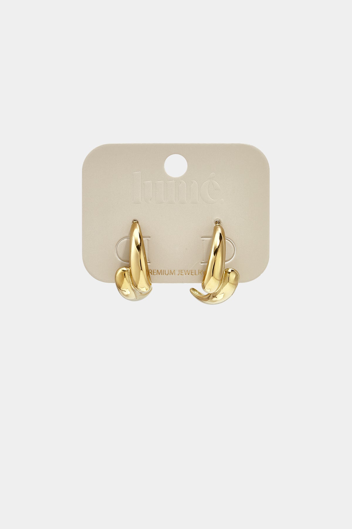 Gold irregular hoop earrings on a beige card with 'premium jewelry' text.
