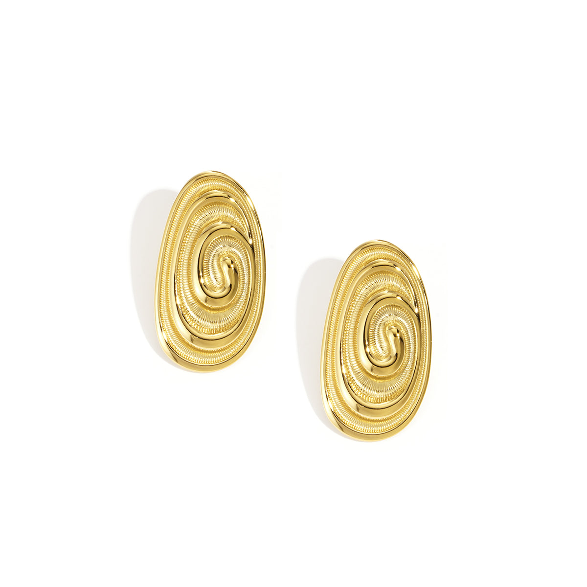 Irregular gold stud earrings with a spiral design.