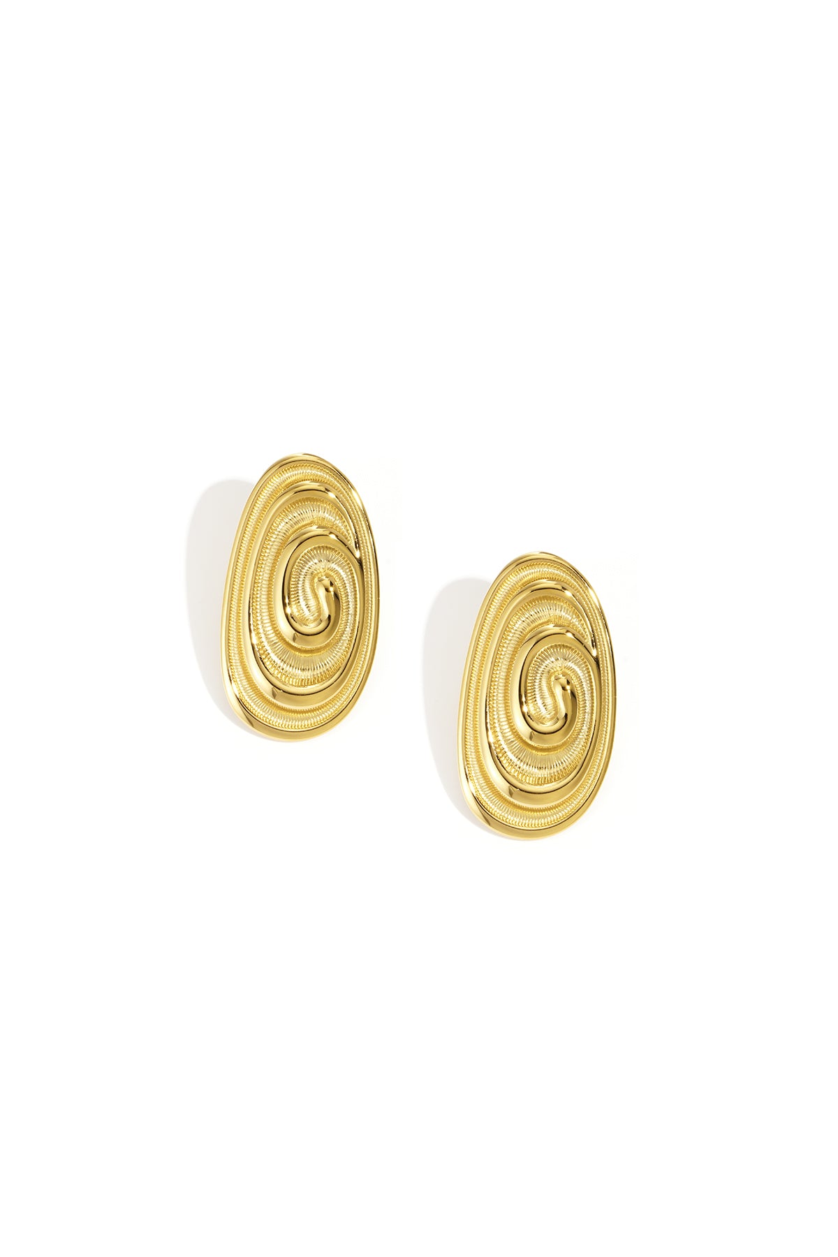 Irregular gold stud earrings with a spiral design.