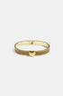 Gold-tone bangle with a khaki enamel band and a gold heart charm.