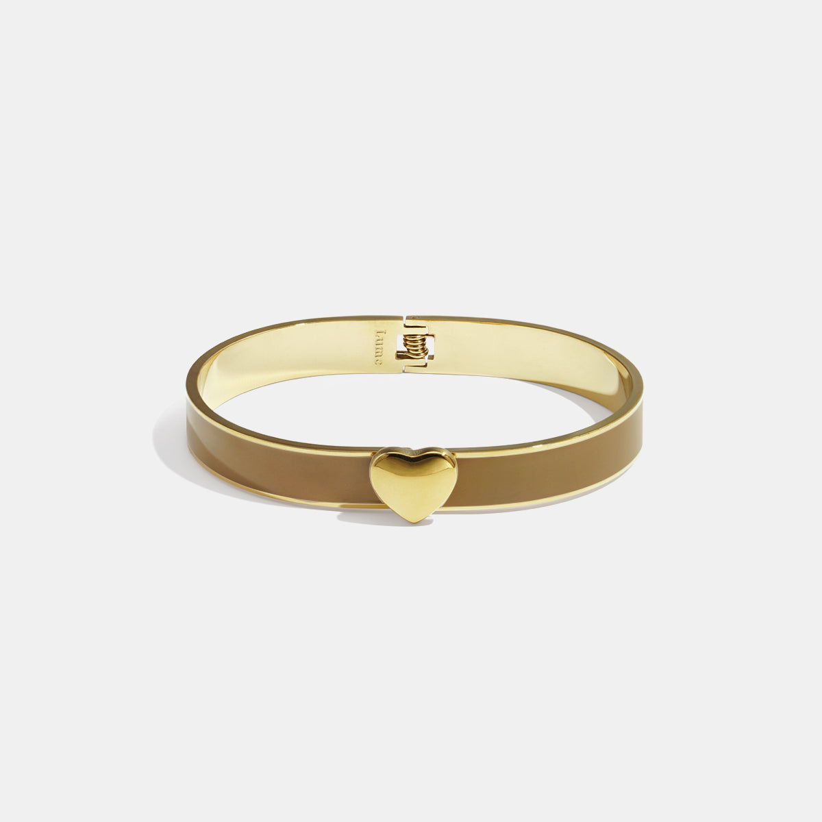 Gold-tone bangle with a khaki enamel band and a gold heart charm.