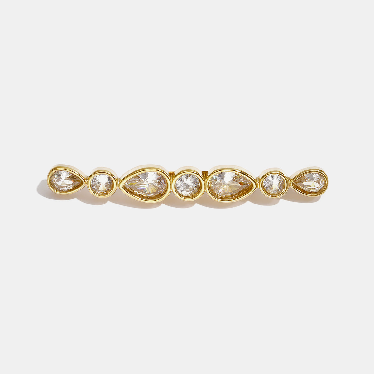 Gold brooch with alternating droplet and circular clear rhinestones.