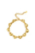 Gold-toned bracelet with heart-shaped links and an adjustable clasp.