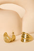 Aurelia Hoop Earrings in gold, featuring a textured, wavy design.