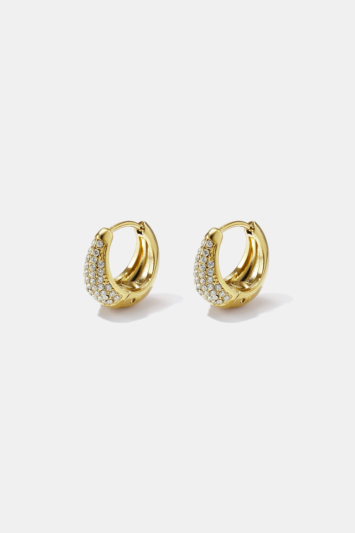 Gold hoop earrings adorned with clear rhinestones, presented as a pair.