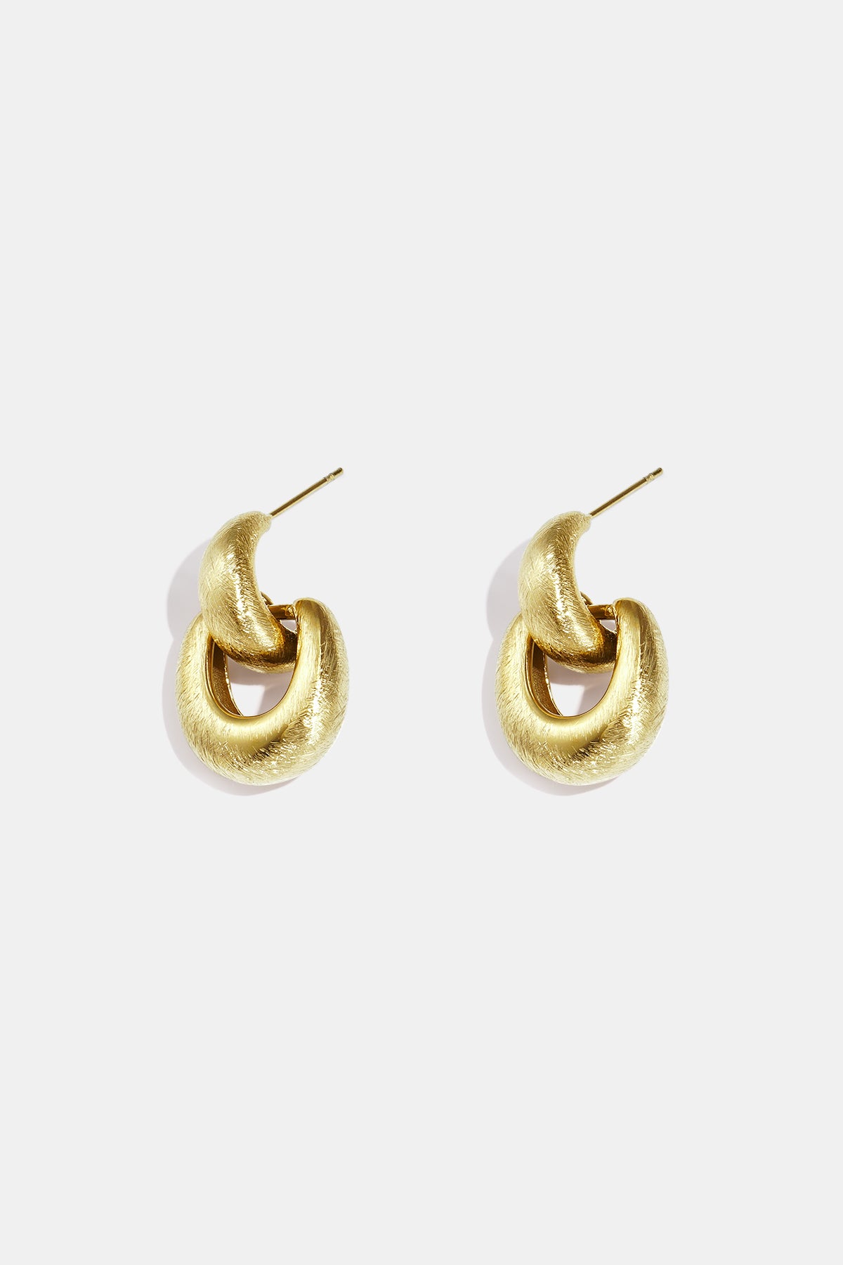 Pair of matte gold Elysian Link Earrings with a textured finish and post backing.