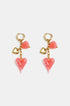 Gold hoop earrings with dangling pink and gold heart charms.