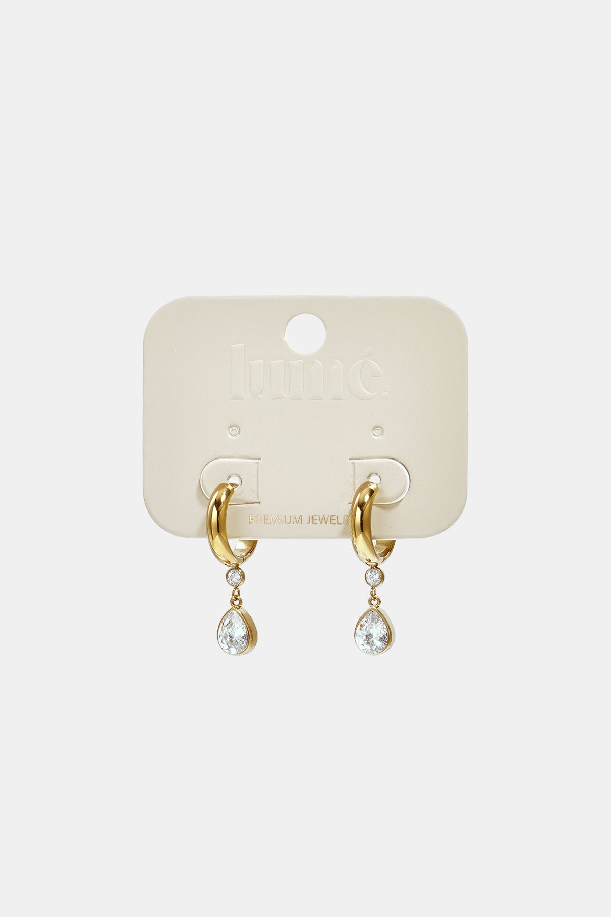 Gold hoop earrings with a dangling pear-shaped zircon and a smaller round zircon.